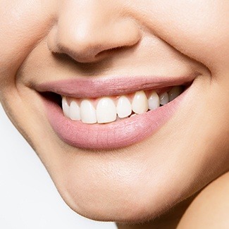 woman's nice looking smile achieved from cosmetic dentistry