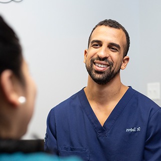 Andrew Tadros, DDS, dentist in East Dallas smiling at dental patient