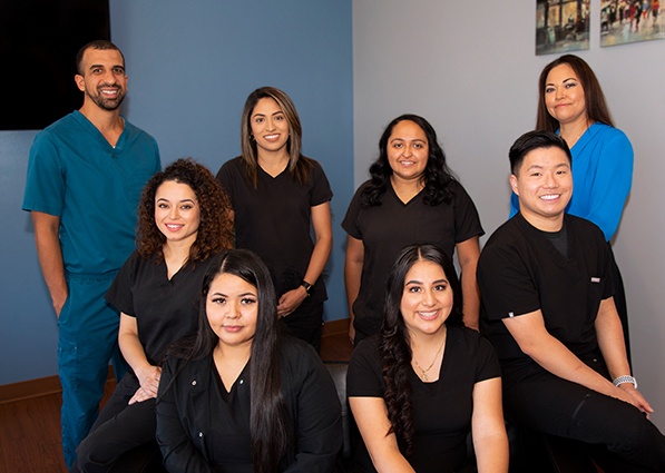 East Dallas Del Rey Dental team in front of reception desk