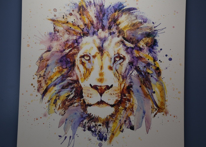 Del Rey Dental painting of lion logo