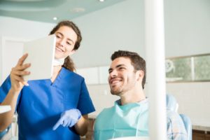 Smiling man visiting East Dallas dentist for dental checkup